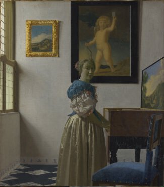 Vermeer - A Young Woman standing at a Virginal